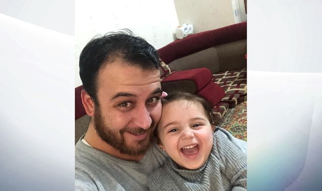 'Heroic' dad teaches little girl to laugh as bombs fall in Syria