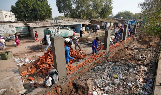 India accused of 'hiding' poor people ahead of Trump visit