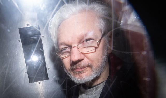 Assange stripped and handcuffed, lawyer tells court
