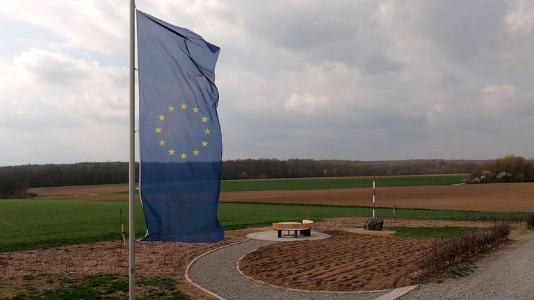 A European flag flutters near a red-white pole, marking the new geographical centre of the European Union in case of Brexit in Gadheim, Germany, April 8, 2019. The town of less than 100 residents prepares to become the geographical centre of the European Union after Brexit. Meanwhile, the EU's current geoegraphical centre, Westerngrund, just 60 kilometres away, will lose its title.     REUTERS/Tilman Blasshofer