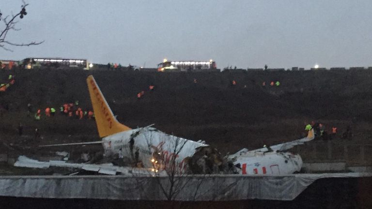 This picture taken on February 05, 2020, shows a Pegasus airlines boeing 737 plane after it skidded off the runway at Istanbul's Sabiha Gokcen airport. - A plane carrying 171 passengers skidded off the runway at an Istanbul airport and split into two after landing in rough weather on February 05, but officials said no-one had died. The aircraft had flown into Istanbul's Sabiha Gokcen airport from the Aegean city of Izmir in very wet weather, NTV broadcaster reported. At least 21 people were injured and taken to hospital, Istanbul Governor Ali Yerlikaya said on Twitter. 