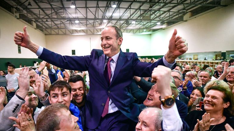 VARIOUS CITIES, IRELAND - FEBRUARY 09: Micheal Martin of Fianna Fail reacts to being elected to the 33rd Dáil at the Irish General Election count for the Cork South-Central constituency at Nemo Rangers GAA on February 9, 2020 in Cork, Ireland. Ireland has gone to the polls following Taoiseach Leo Varadkar's decision to call a snap election. In the last general election, no party came close to a majority and it took 10 weeks of negotiations to form a government with Varadkar's party Fine Gael eventually forming a coalition with Fianna Fail. Sinn Fein and their leader Mary Lou McDonald have made a late surge and could become the largest party according to the latest opinion polls. In order to win an outright majority and govern alone, parties need to win 80 seats - many political experts have predicted another hung parliament with exit polls showing the three main parties deadlocked.  (Photo by Jeff J Mitchell/Getty Images)