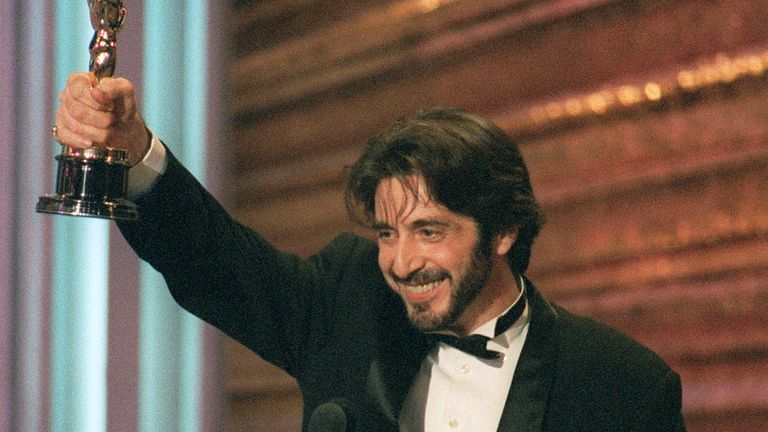 Al Pacino holds up his Oscar during the 65th Annual Academy Awards ceremony 29 March 1993 after being presented the Best Actor award for his performance in Martin Brest&#39;s &#39;Scent of a Woman&#39;