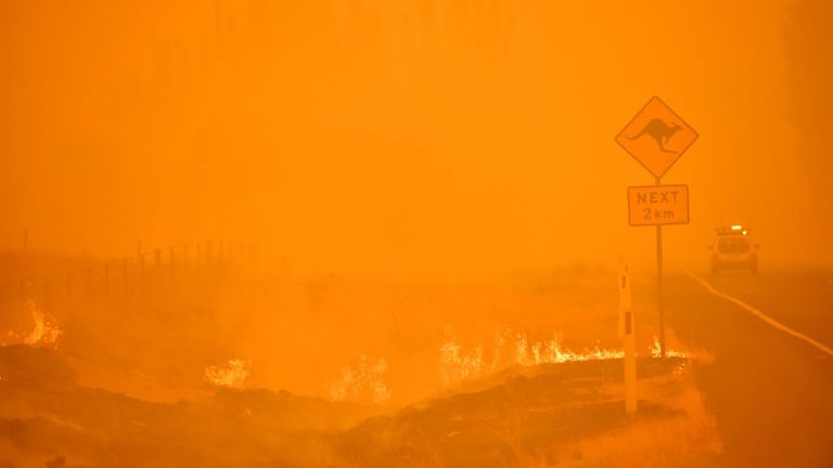 Bushfires burn near the town of Bumbalong south of Canberra on February 1, 2020. - Authorities in Canberra on January 31, 2020 declared the first state of emergency in almost two decades as a bushfire bore down on the Australian capital. (Photo by PETER PARKS / AFP) (Photo by PETER PARKS/AFP via Getty Images)
