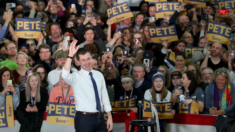 Democratic presidential candidate former South Bend, Indiana Mayor Pete Buttigieg arrives on stage at Lincoln High School during a Get Out The Caucus rally February 2, 2020 in Des Moines, Iowa