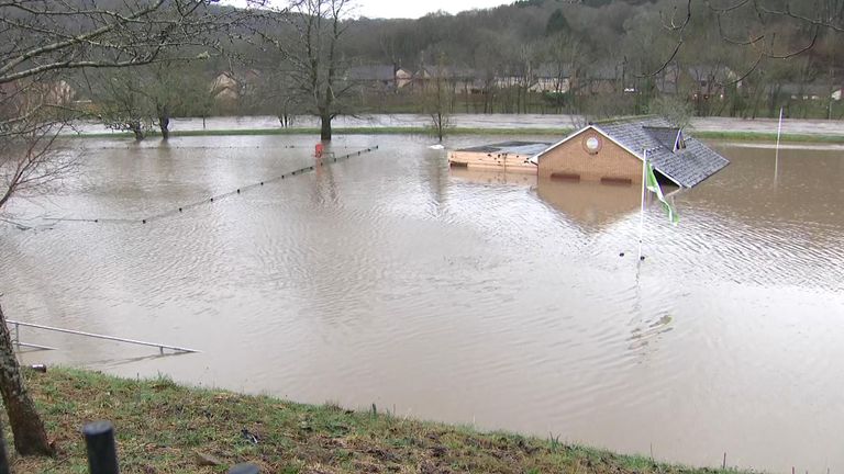 A building close to the River Taff submerged by the flood waters