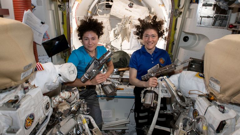 US astronauts Jessica Meir (L) and Christina Koch in the International Space Station