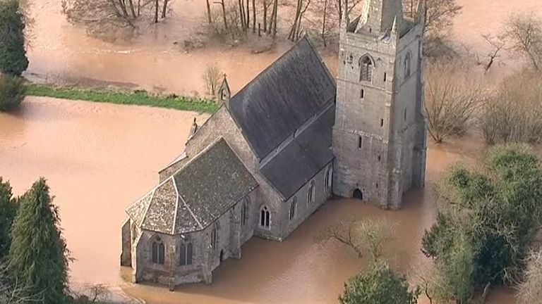 A church in Hereford is surrounded by flood water 