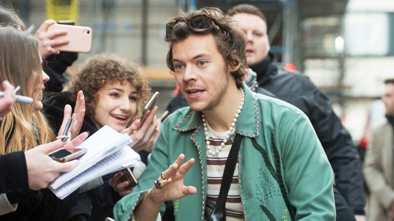 Harry Styles speaking to fans the day before his ex-girlfriend Caroline Flack was found dead