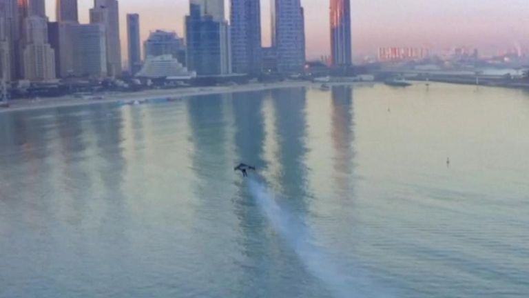 jetman heads off towards the city of Dubai