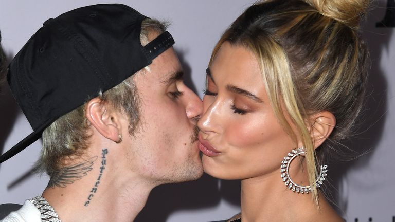 Canadian singer Justin Bieber (L) and wife US model Hailey Bieber arrive for YouTube Originals&#39; "Justin Bieber: Seasons" premiere at the Regency Bruin Theatre in Los Angeles on January 27, 2020