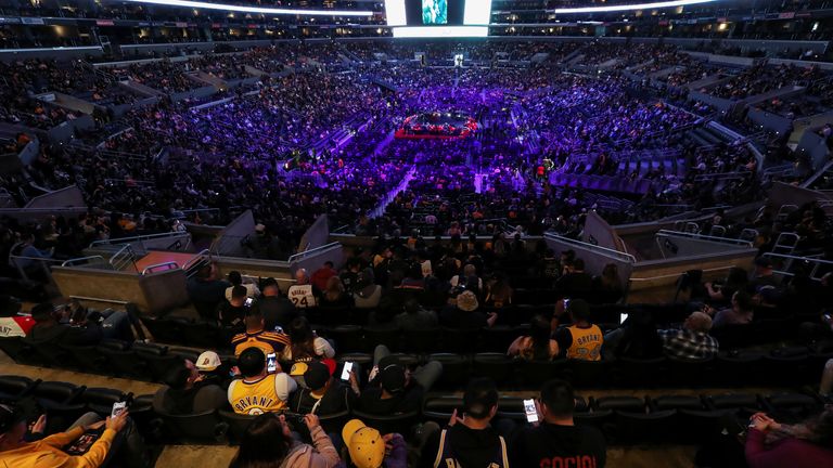 People attend a public memorial for NBA great Kobe Bryant, his daughter Gianna and seven others killed in a helicopter crash on January 26, at the Staples Center in Los Angeles, California, U.S., February 24, 2020. REUTERS/Lucy Nicholson