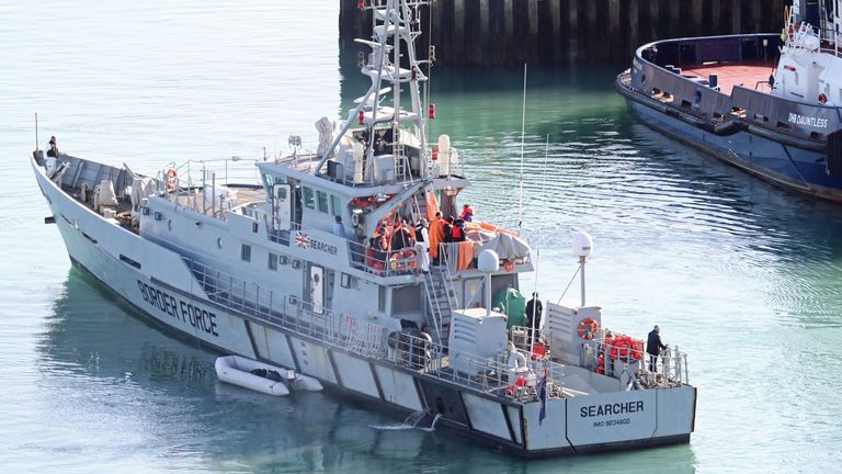 Migrants are brought ashore on the Border  Force vessel Searcher in Dover after HM Coastguard said it is responding to "a number of incidents" in the English Channel, along with Border Force, Kent Police and RNLI lifeboats. PA Photo. Picture date: Thursday February 6, 2020. See PA story SEA Migrants . Photo credit should read: Gareth Fuller/PA Wire