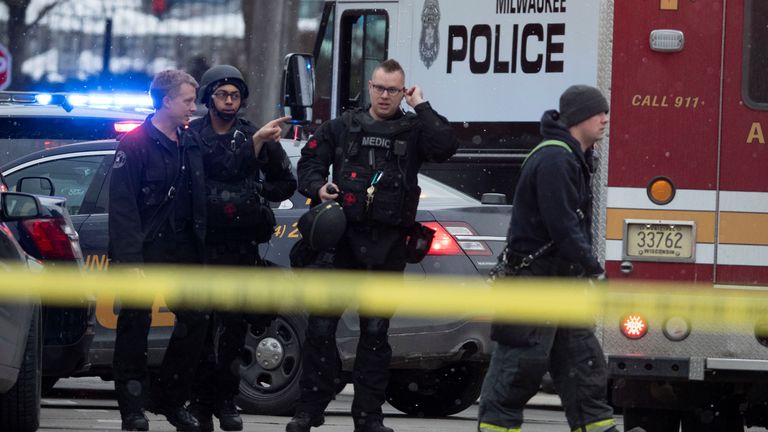 Police and emergency officials work at an active shooter scene at the Molson Coors headquarters in Milwaukee, Wisconsin, February 26, 2020