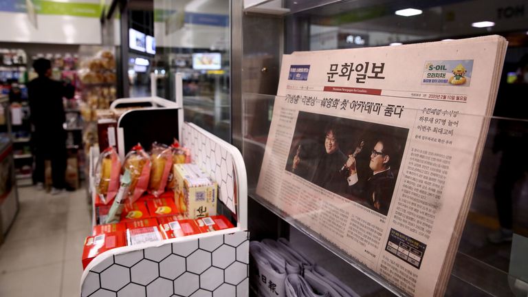 Newspapers at a convenience store on February 10, 2020 in Seoul, South Korea. Bong Joon-ho&#39;s "Parasite" has bagged four Oscar titles, becoming the first non-English language film to win best picture