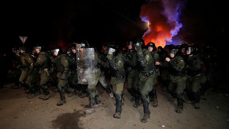 Ukrainian police officers clashed with protesters in the village of Novi Sanzhary