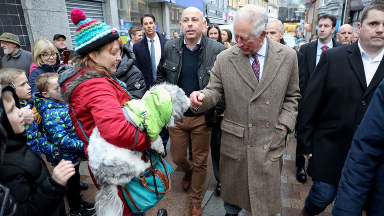Prince Charles has met people in flood-hit Wales after periods of heavy rain