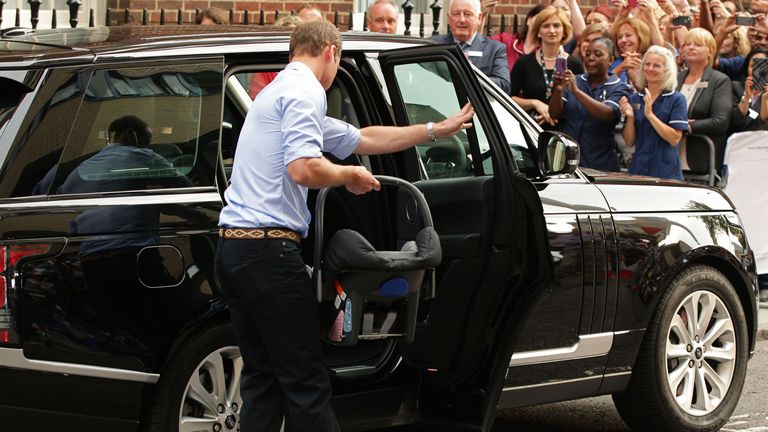 Prince William leaving hospital with Prince George in 2013