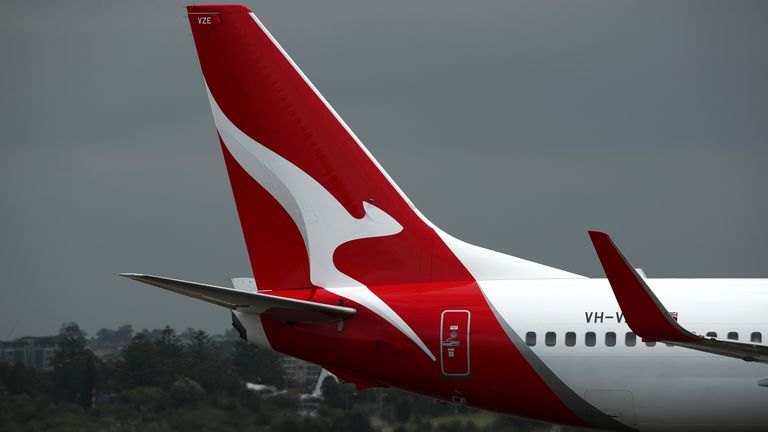 A Qantas commercial plane takes off at Sydney Airport on March 14, 2019 in Sydney, Australia