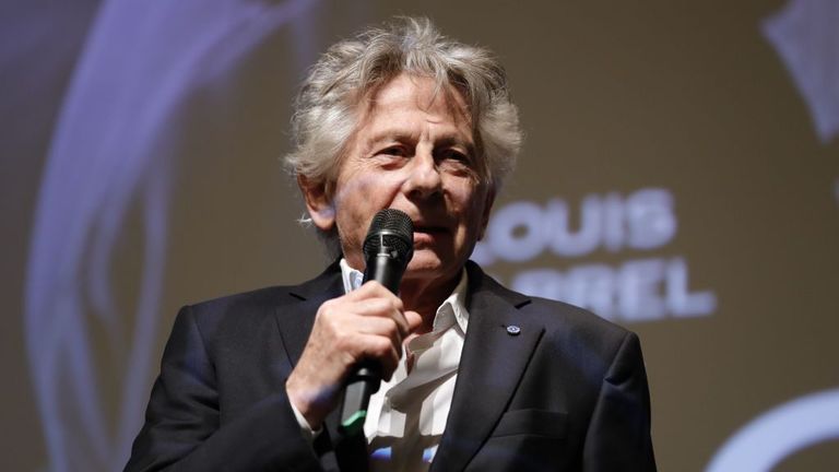 Polanski speaks on stage after the preview of the film