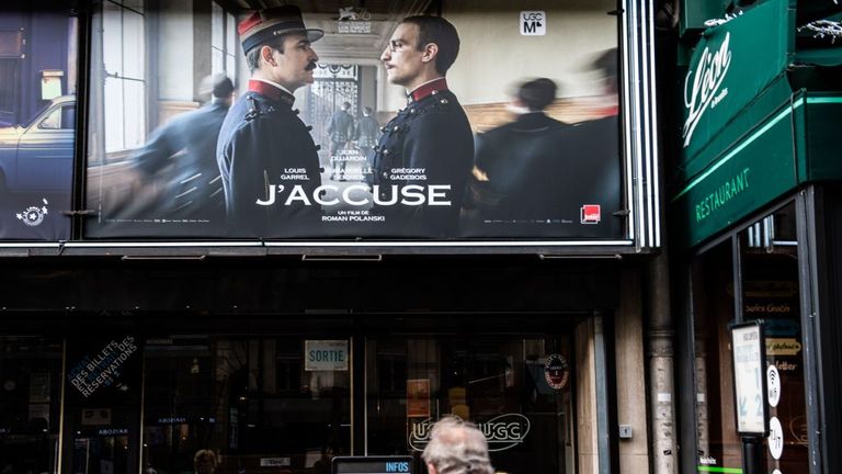 A poster for J'accuse displayed on a cinema in Paris