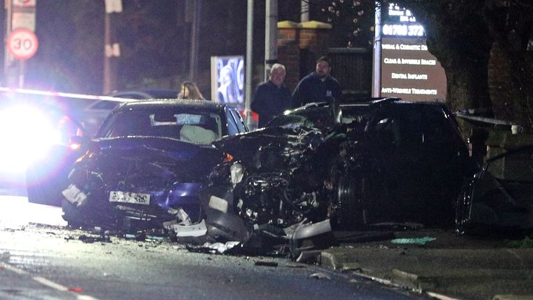 Two badly damaged cars at the scene