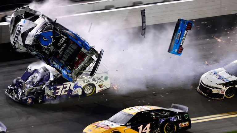 DAYTONA BEACH, FLORIDA - FEBRUARY 17: Ryan Newman, driver of the #6 Koch Industries Ford, and Corey LaJoie, driver of the #32 RagingBull.com Ford, crash during the last lap of the NASCAR Cup Series 62nd Annual Daytona 500 at Daytona International Speedway on February 17, 2020 in Daytona Beach, Florida. (Photo by Jared C. Tilton/Getty Images)