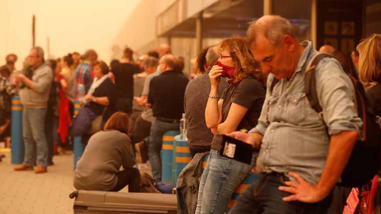 Stranded passengers wait at Las Palmas Airport in Gran Canaria