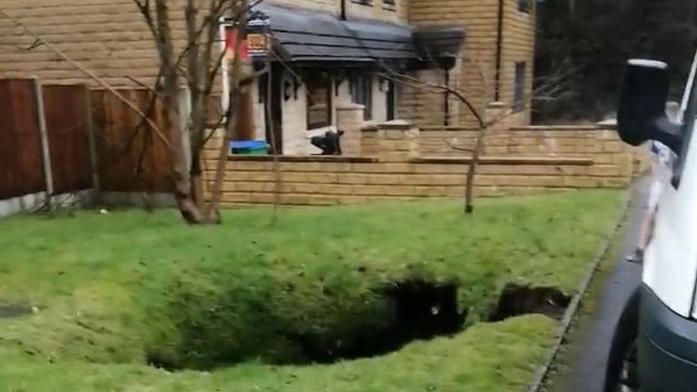 A sinkhole has opened up in the ground in Belfield, Greater Manchester. Pic: Amanda Webster
