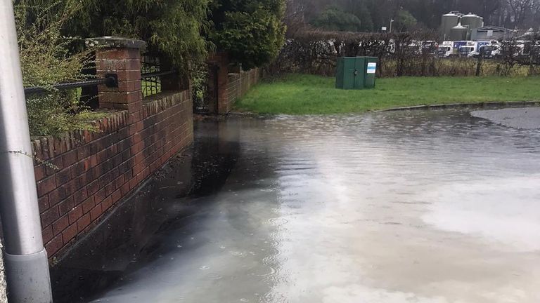 Heavy rain is mixed with milk after a dairy flooded in Stirling. Pic: Twitter/ Fior_Training