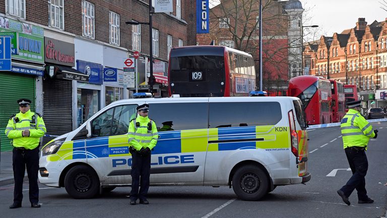 Police officers near the site of the attack in Streatham