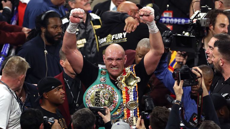 Tyson Fury celebrates his stunning victory