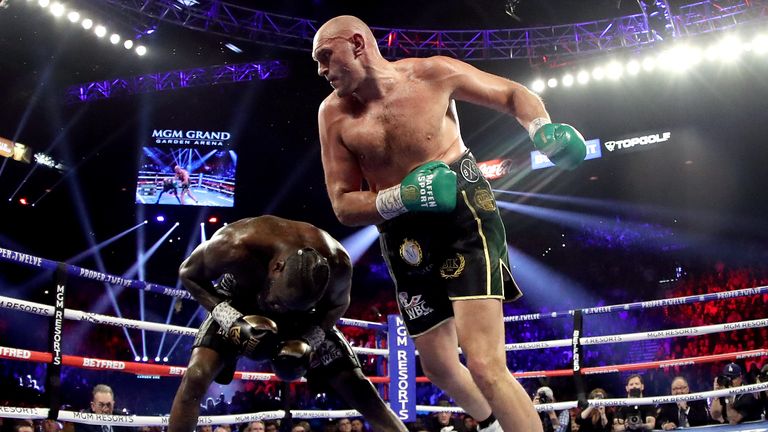 LAS VEGAS, NEVADA - FEBRUARY 22: Tyson Fury (R) punches Deontay Wilder during their Heavyweight bout for Wilder&#39;s WBC and Fury&#39;s lineal heavyweight title on February 22, 2020 at MGM Grand Garden Arena in Las Vegas, Nevada. (Photo by Al Bello/Getty Images)