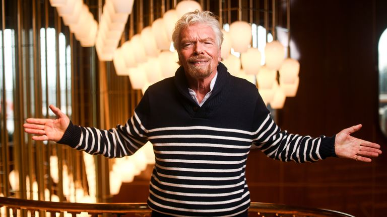 Richard Branson, founder of Virgin Group, poses for a photograph on board of his new cruise liner, the Scarlet Lady 