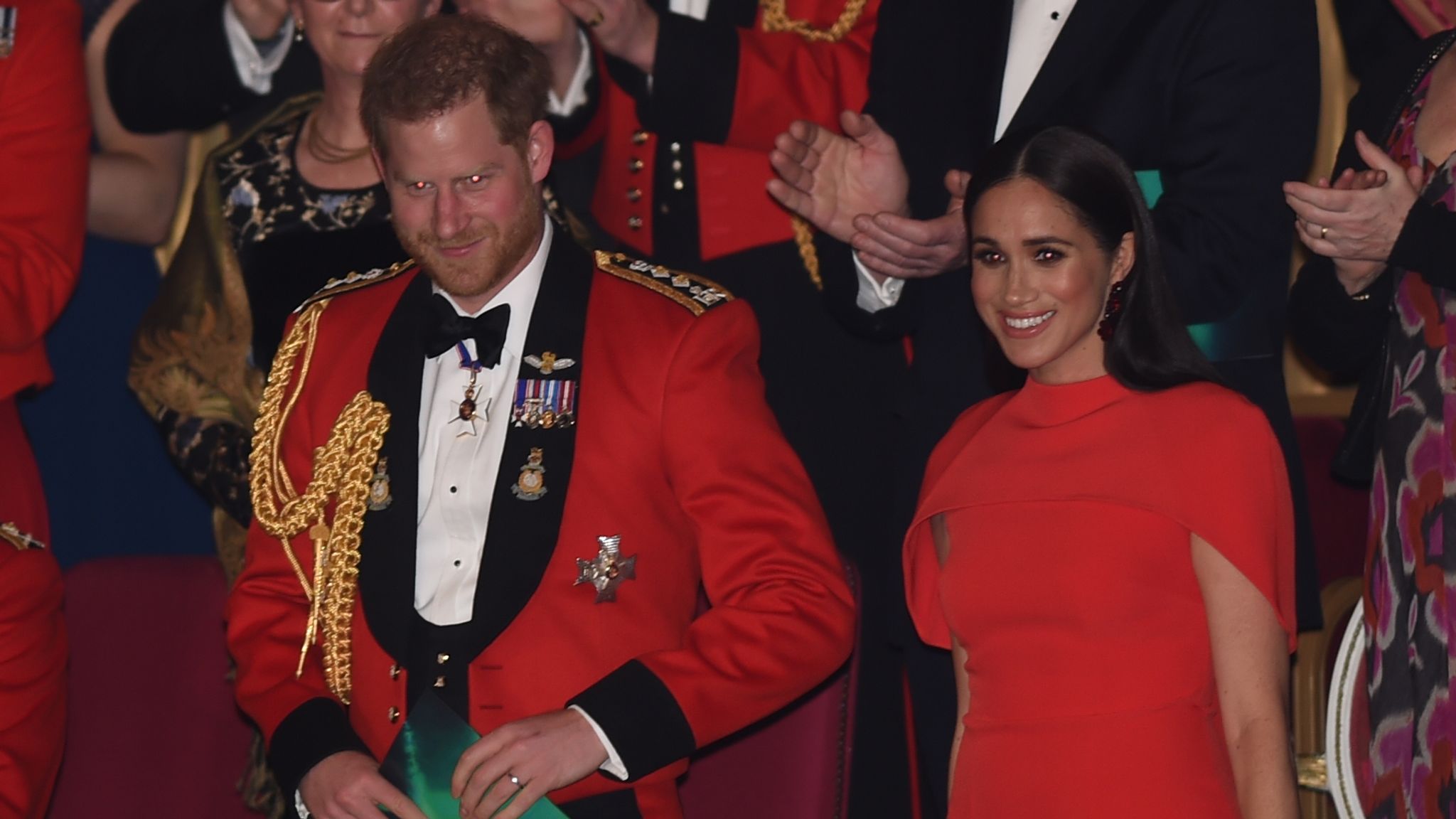 Harry and Meghan get standing ovation at one of their final royal ...