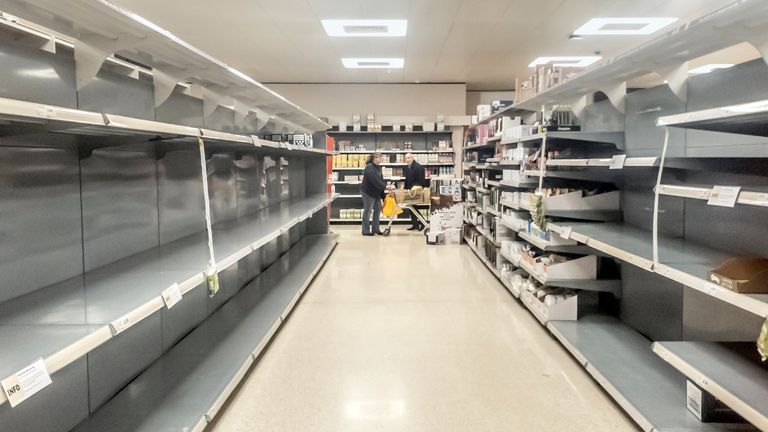 Empty supermarket shelves in Coton near Leeds, Yorkshire, the day after Prime Minister Boris Johnson called on people to stay away from pubs, clubs and theatres, work from home if possible and avoid all non-essential contacts and travel in order to reduce the impact of the coronavirus pandemic.