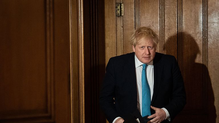 Britain's Prime Minister Boris Johnson arrives to address a news conference to give a daily update on the government's response to the novel coronavirus COVID-19 outbreak, inside 10 Downing Street in London on March 19, 2020. (Photo by Leon Neal / POOL / Getty Images) (Photo by LEON NEAL/POOL/AFP via Getty Images)
