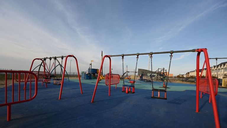 A deserted playground is pictured in Rhyl, north Wales on March 23, 2020. - Prime Minister Boris Johnson warned on Sunday he may impose tougher controls on the British public as packed parks, markets and cafes at the weekend showed thousands of people defying government warnings about social distancing. (Photo by Paul ELLIS / AFP) (Photo by PAUL ELLIS/AFP via Getty Images)