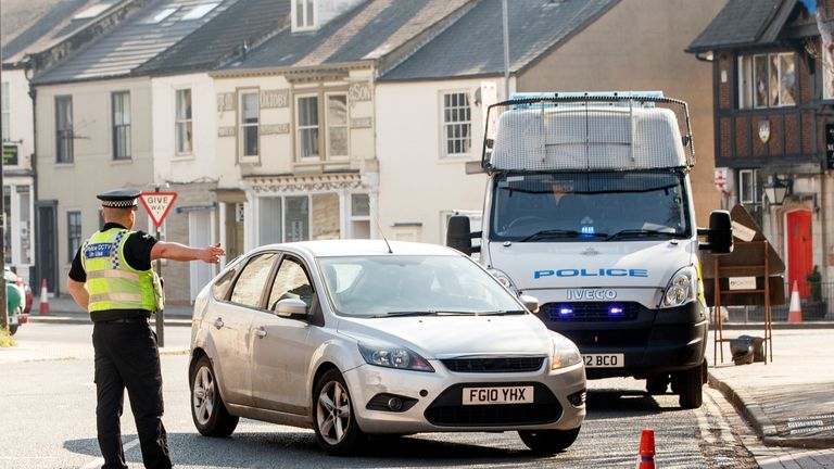 Police at a vehicle checkpoint in York where officers from North Yorkshire Police were ensuring that motorists and their passengers are complying with government restrictions and only making essential journeys, after Prime Minister Boris Johnson put the UK in lockdown to help curb the spread of the coronavirus.