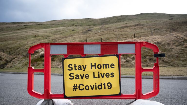 BRECON, WALES - MARCH 28: A sign on the A470 near Pen y Fan warns motorists to stay at home to save lives on March 28, 2020, in Brecon, Wales. Last weekend the area was busy with walkers. The Coronavirus (COVID-19) pandemic has spread to many countries across the world, claiming over 25,000 lives and infecting hundreds of thousands more. (Photo by Matthew Horwood/Getty Images)