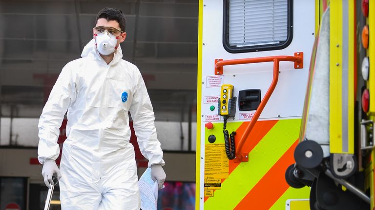 A paramedic wearing personal protective equipment (PPE)outside St Thomas' Hospital in Westminster, London, as the UK continues in lockdown to help curb the spread of the coronavirus.