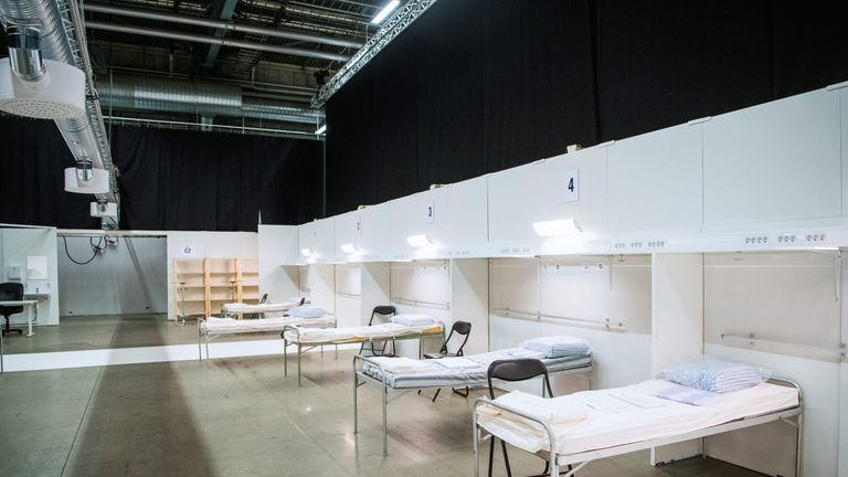 A picture taken on March 30, 2020 shows a view of beds at a field hospital under construction in the Stockholm International Fairs facility, in prevision of an increase of patients infected by the novel coronavirus. (Photo by Jonathan NACKSTRAND / AFP) (Photo by JONATHAN NACKSTRAND/AFP via Getty Images)