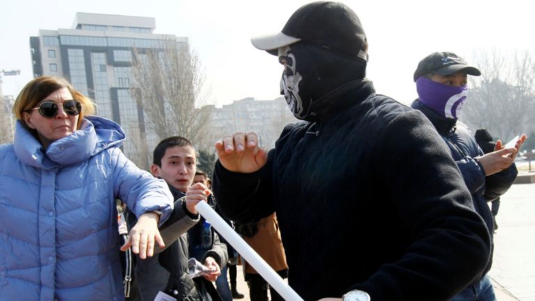The rally in Bishkek was interrupted after masked men attacked attendees