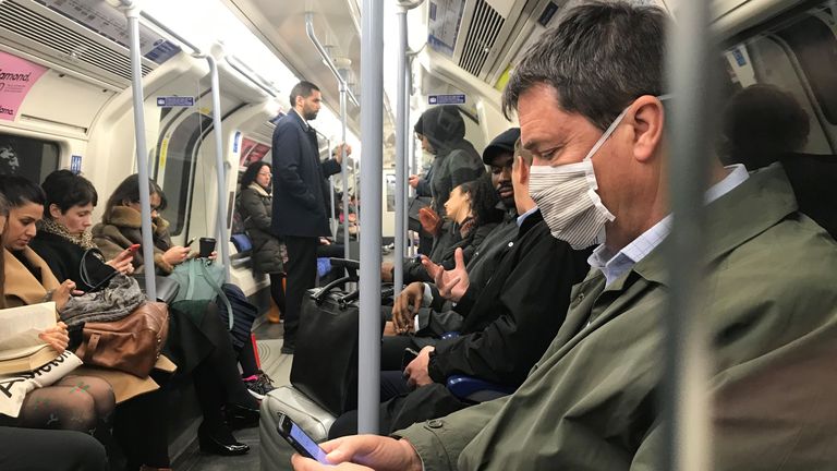 A man on the Jubilee line of the London Underground tube network wearing a protective facemask on the day that Heath Secretary Matt Hancock said that the number of people diagnosed with coronavirus in the UK has risen to 51. PA Photo. Picture date: Tuesday March 3, 2020. See PA story HEALTH Coronavirus. Photo credit should read: Kirsty O&#39;Connor/ PA Wire