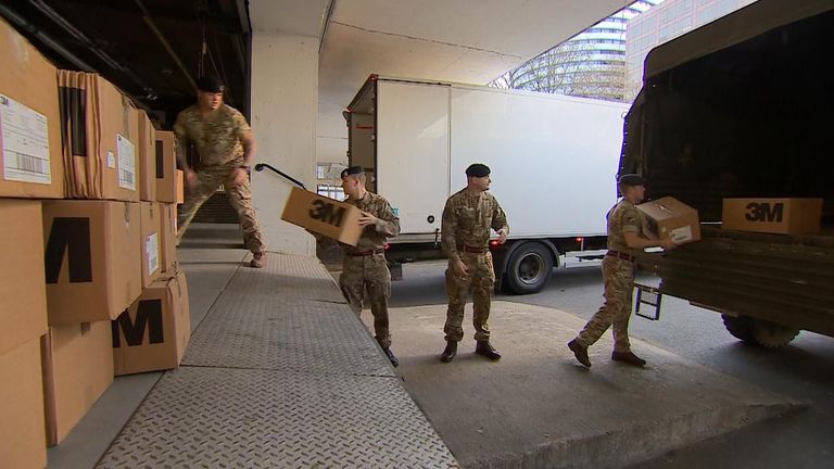 Troops help deliver protective equipment at St Thomas&#39; Hospital in London