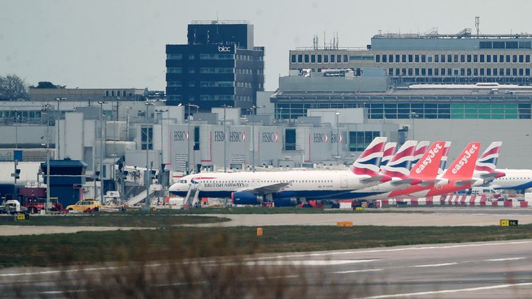 British Airways and easyJet planes are seen parked at Gatwick Airport in Crawley, West Sussex, after easyJet announced it has grounded its entire fleet of 344 aircraft due to the coronavirus pandemic.