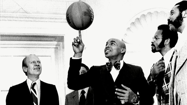 President Gerald Ford, enjoys a performance by Curly Neal and The Harlem Globetrotters, when they visited The White House, December 6, 1974. Pic: Everett/Shutterstock .