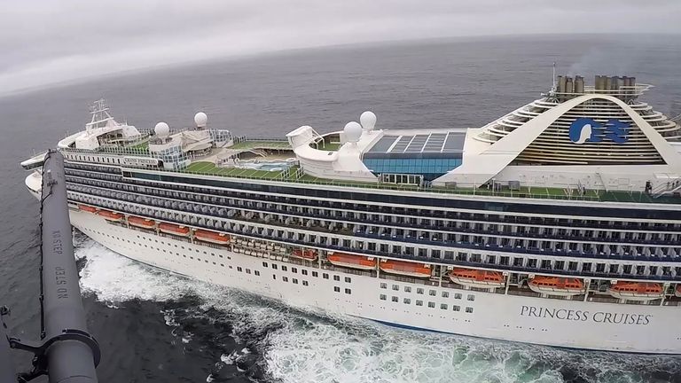 A helicopter deliver coronavirus test kits to the Grand Princess