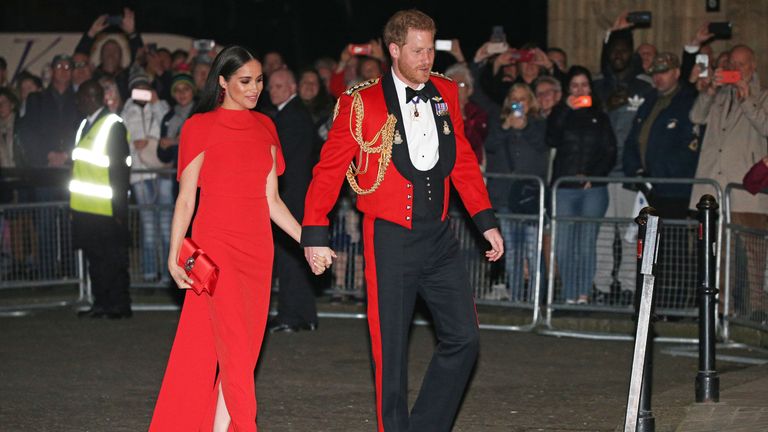 The couple wore matching red outfits to the festival