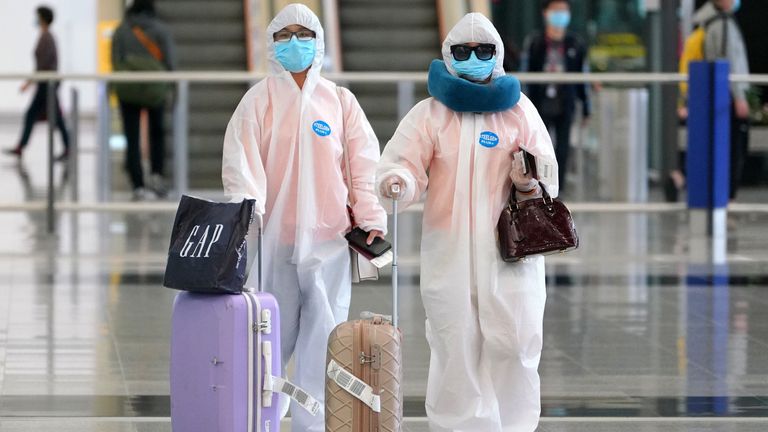 Some people arriving back in Hong Kong are taking no chances